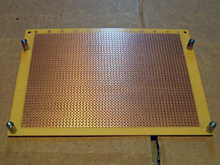 Underside of the perfboard showing PCB spacers